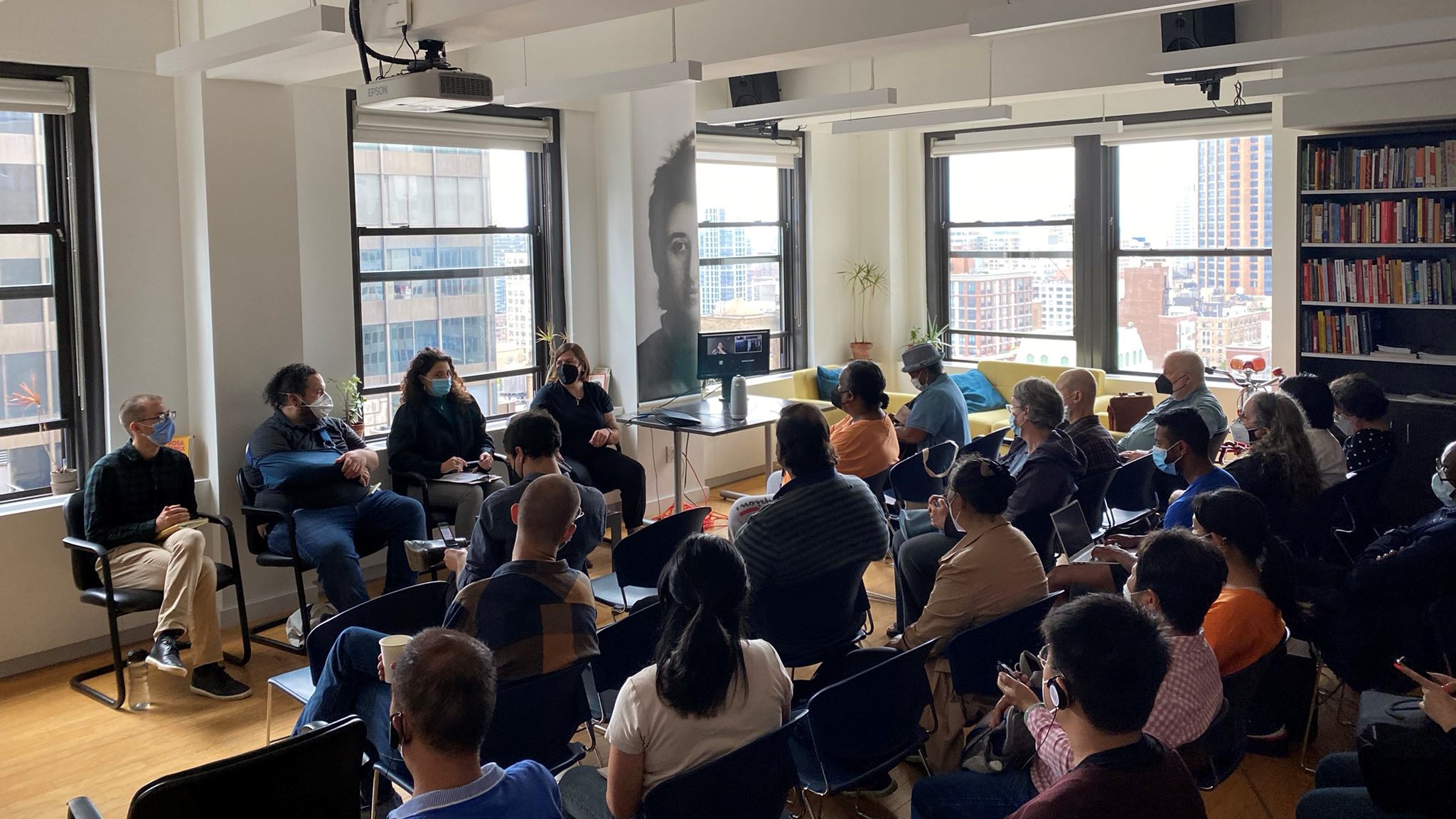 Audience and panel of 4 people at the RLS NYC office